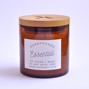 Amber jar candle with logo on lid