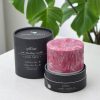 Hand-poured Cinnamon Cannon pillar candle made with palm wax and natural essential oils with its box.