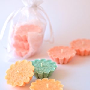 Floating palm wax candles for wedding favors