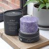 Hand-poured Lavender Forever pillar candle made with palm wax and natural essential oils with its box.