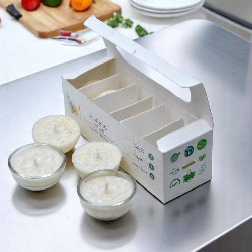 A box of hand-poured Pint of Mint tealights made with palm wax and natural essential oils.