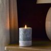 Hand-poured Merry Rosemary pillar candle made with palm wax and natural essential oils.