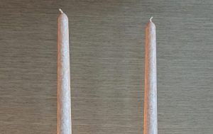 PalmLights velvet vanilla taper and pillar candles with glass jar candles creating a warm and elegant dining ambiance at home