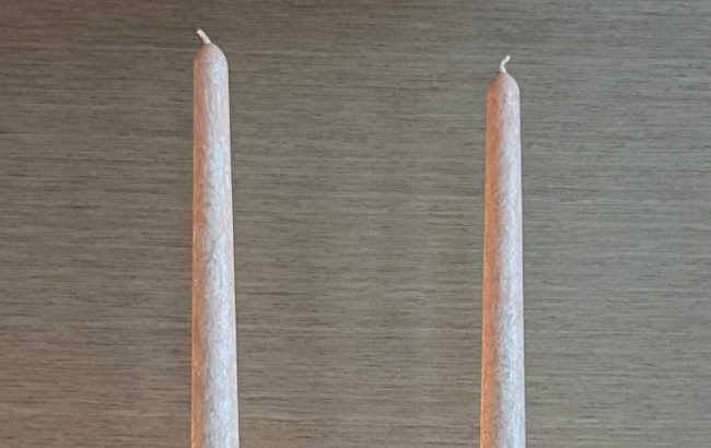 PalmLights velvet vanilla taper and pillar candles with glass jar candles creating a warm and elegant dining ambiance at home