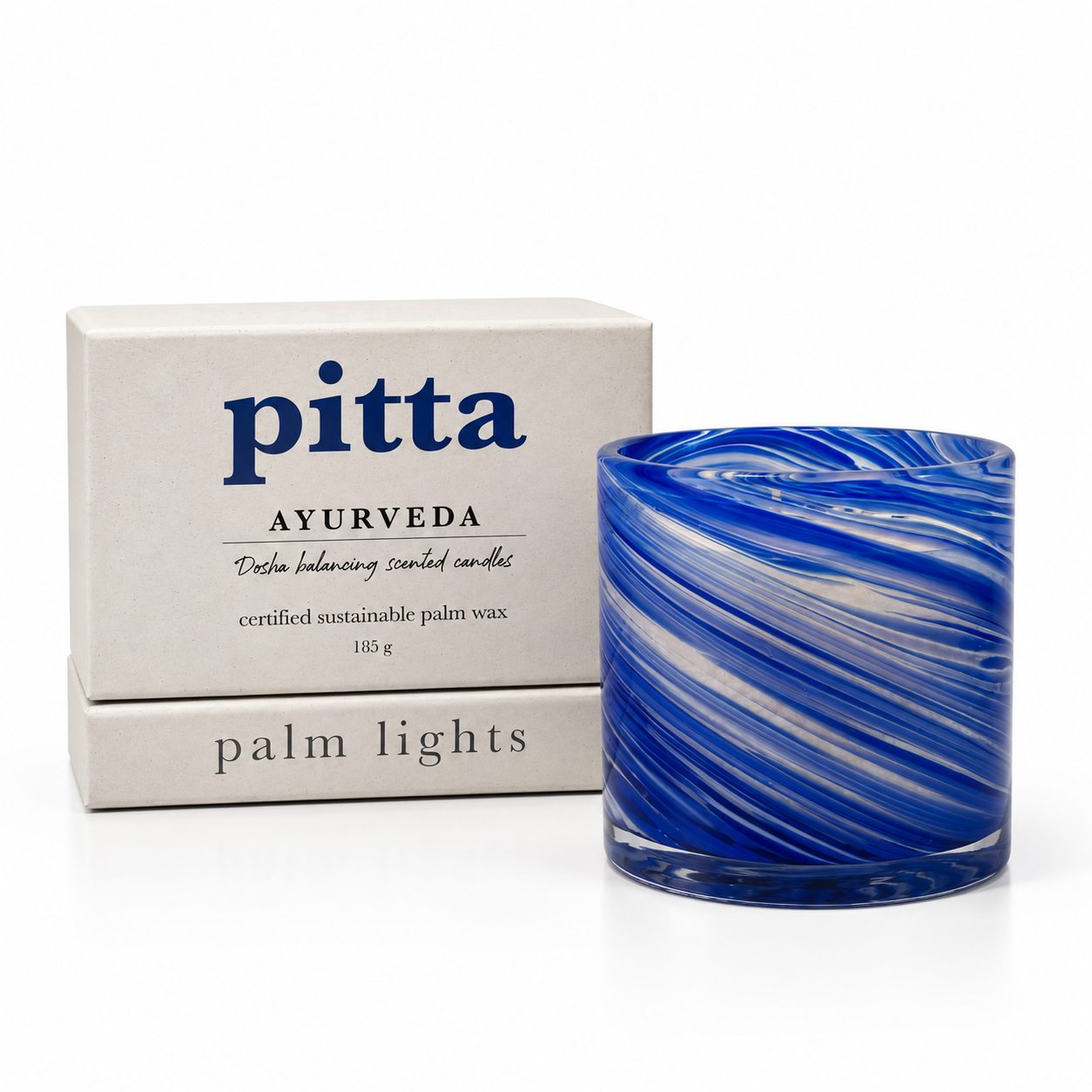 Pitta dosha candle in amber glass jar, part of the Palm Lights Ayurveda Candle Trio, white background